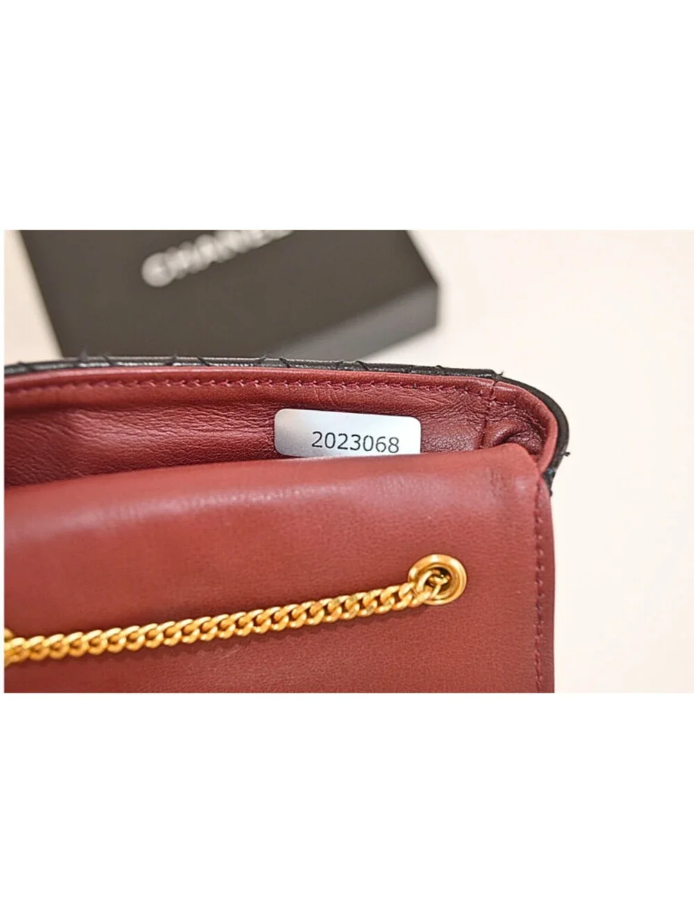 Chanel A Black Quilted Lambskin Leather Micro Flap Bag With Gold Hardware